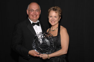 Teri and Bill Popp receiving the 2008 Starkey Hearing Foundation Humanitarian Award